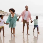 Family walking on the beach